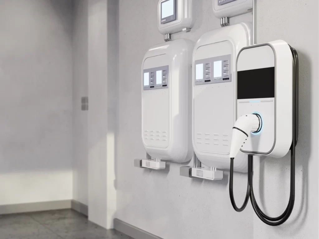 Image of an EV charger on the wall in the garage of a residential house in Tucson