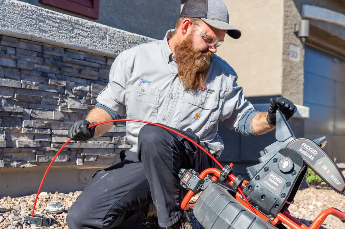 Done Rite Services emergency plumber in Tucson, inspecting sewer line for repair and replacement