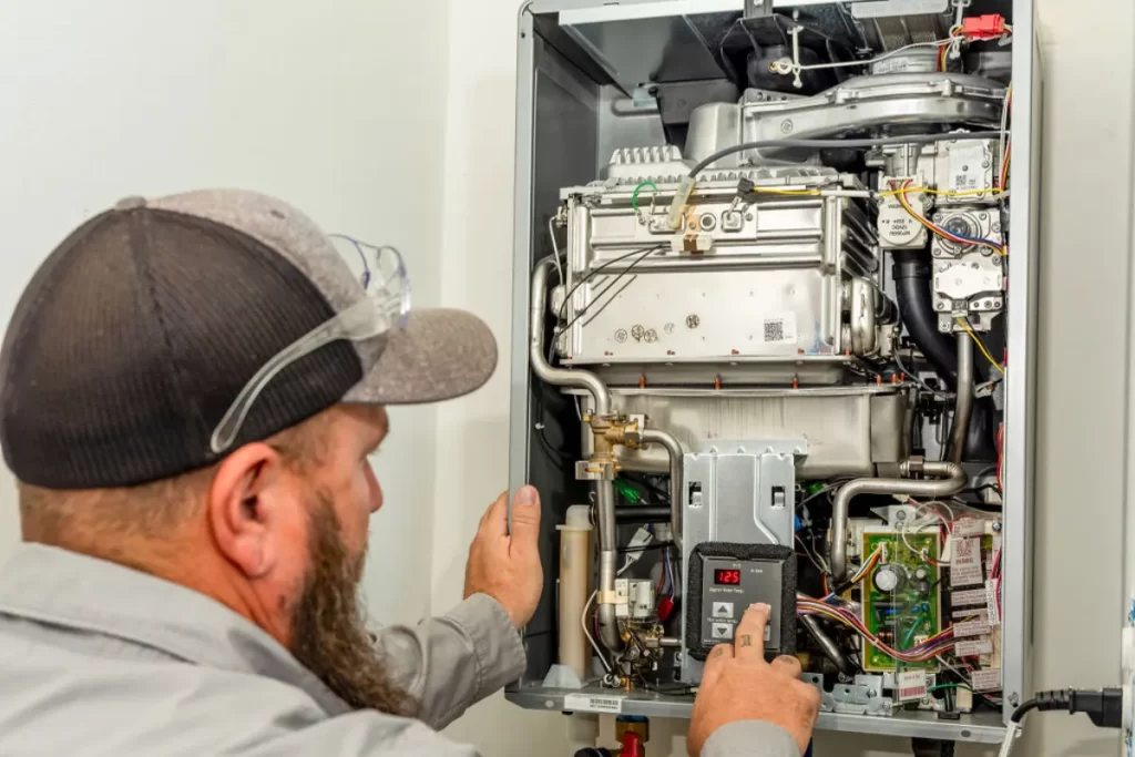 image of an open wiring tankless water heater being set up by Done Rite Services