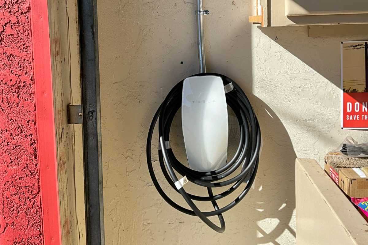 A newly installed EV charger setup by Done Rite Services in a home's garage.