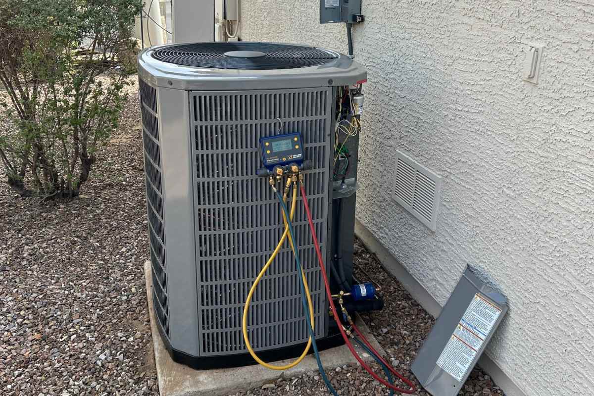 Outdoor AC compressor unit, helping Sahuarita homeowners understand their HVAC system.