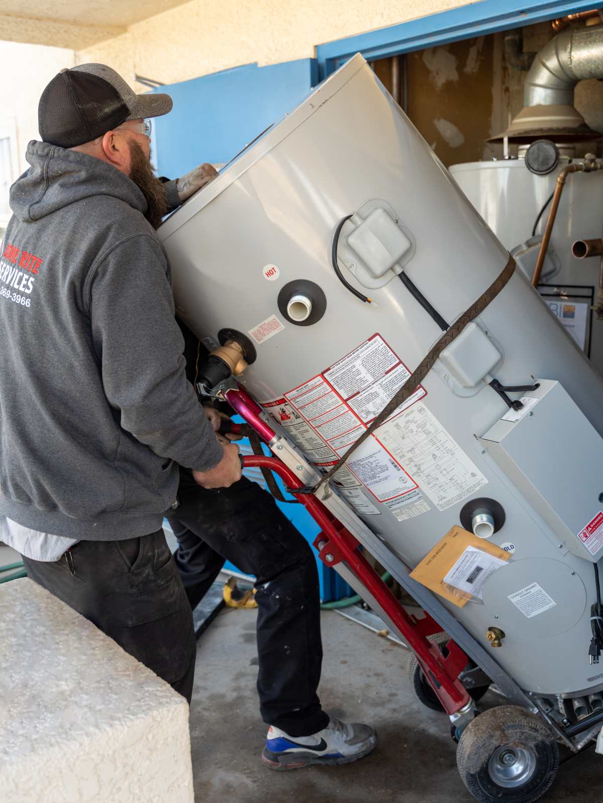 Done Rite Services expert plumber working on a water heater repair in Green Valley.