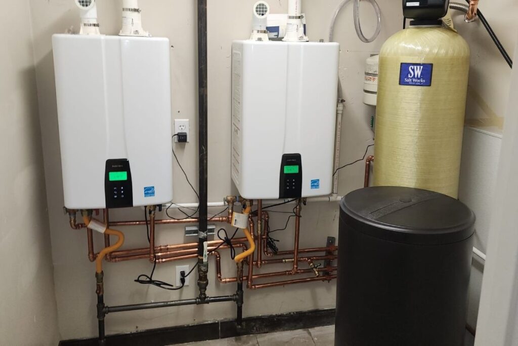 Image of two tankless water heaters, showing maintenance steps for flushing the unit.