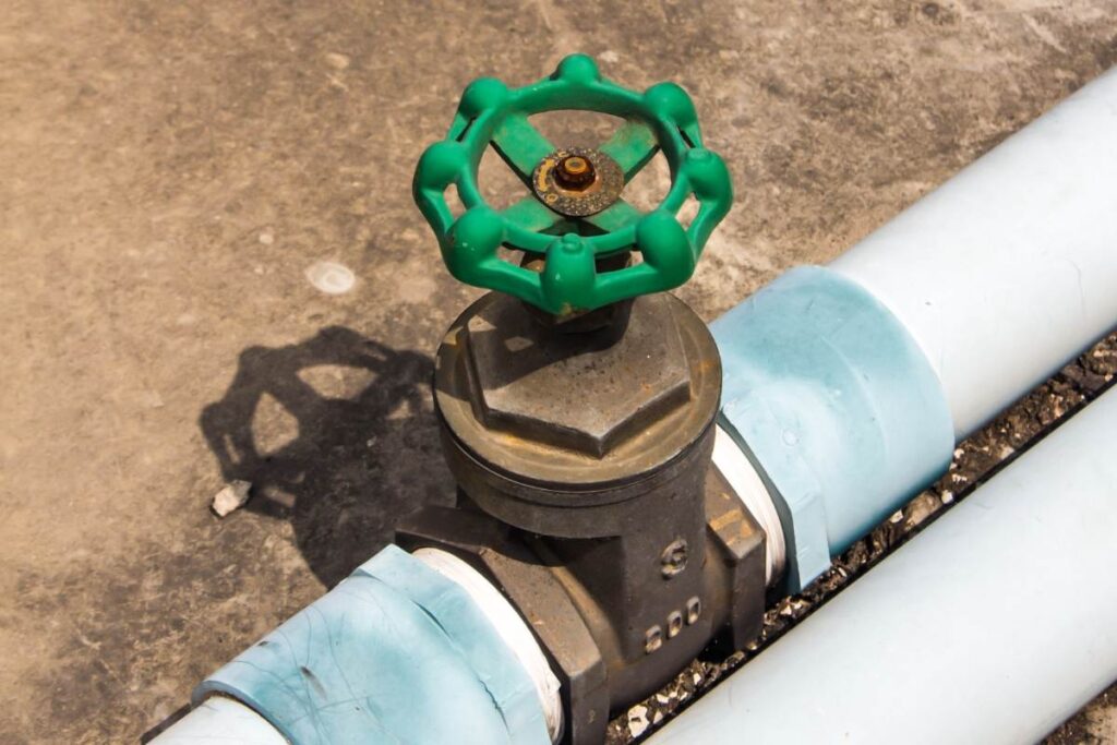 Close-up of a water shut-off valve, demonstrating its importance in plumbing emergencies.